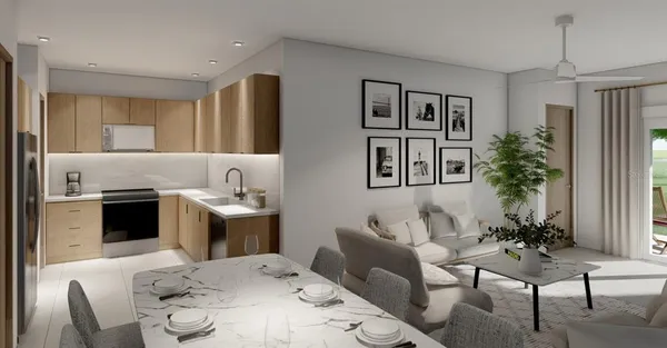 a view of kitchen with furniture and large windows