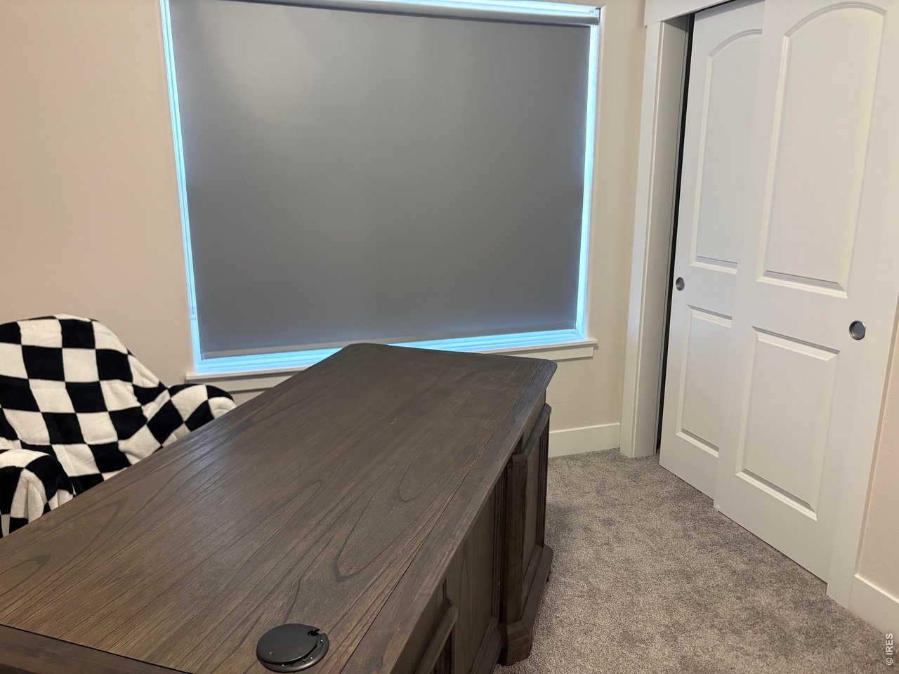 102 7th Avenue Wiggins, CO 80654 - Photo 16 of 17 an empty room with windows