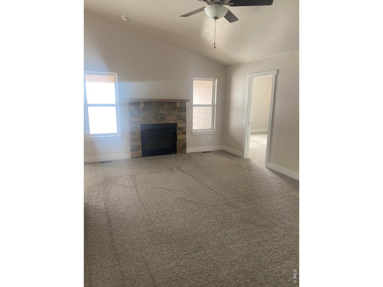 102 7th Avenue Wiggins, CO 80654 - Photo 5 of 17 a view of kitchen and windows