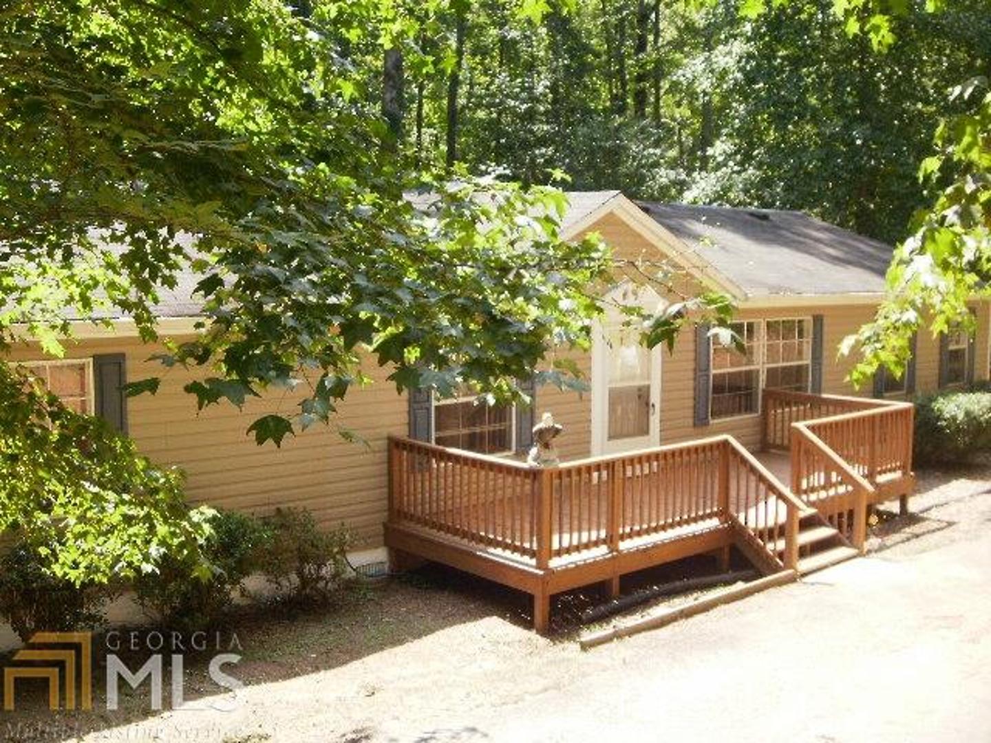 138 Katy Lake Road Jackson, GA 30233 - Photo 1 of 1 a view of a house with a yard porch and sitting area