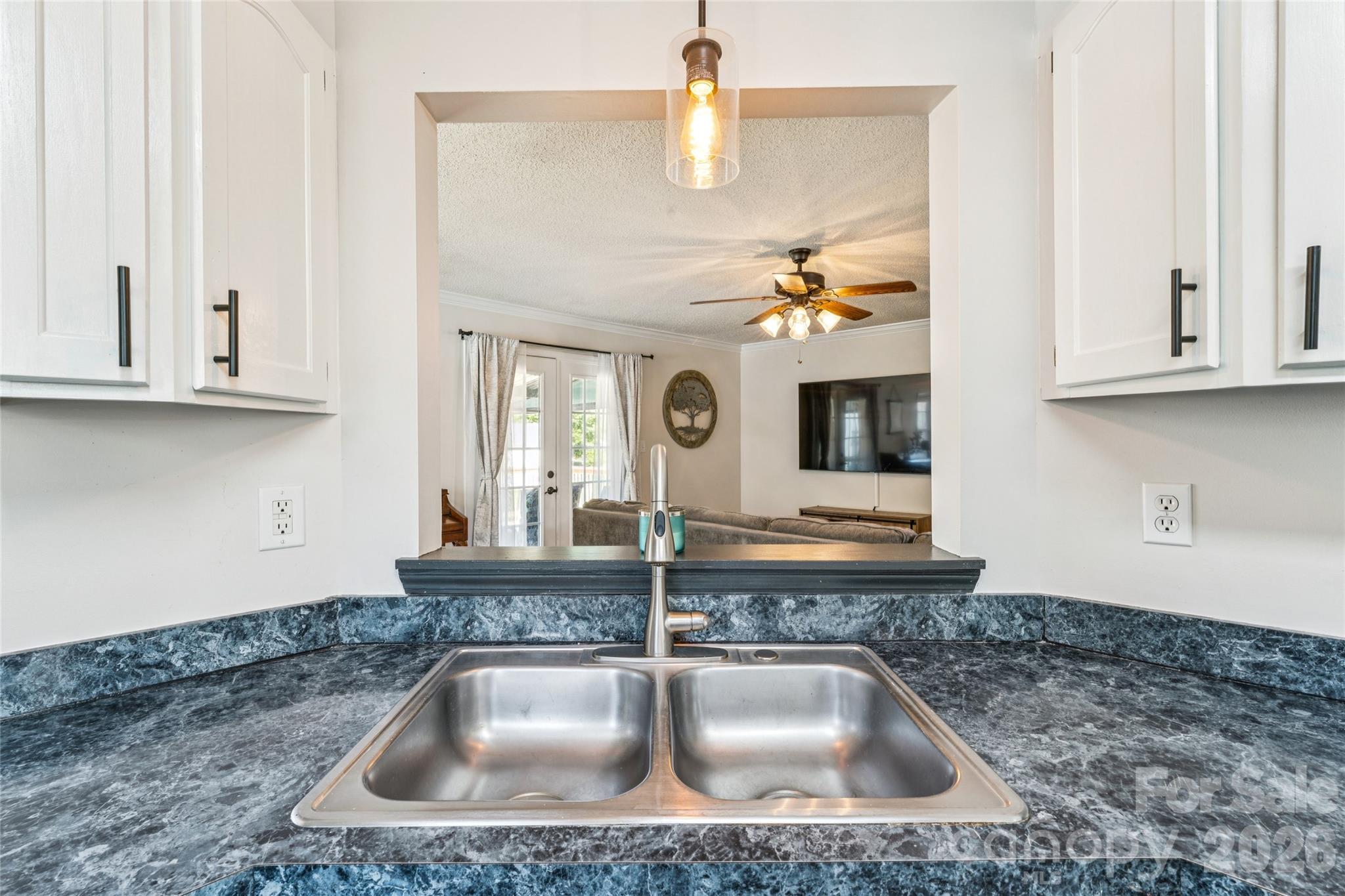 103 Quarry Way Salisbury, NC 28146 - Photo 11 of 47 a kitchen with granite countertop a sink stainless steel appliances and cabinets