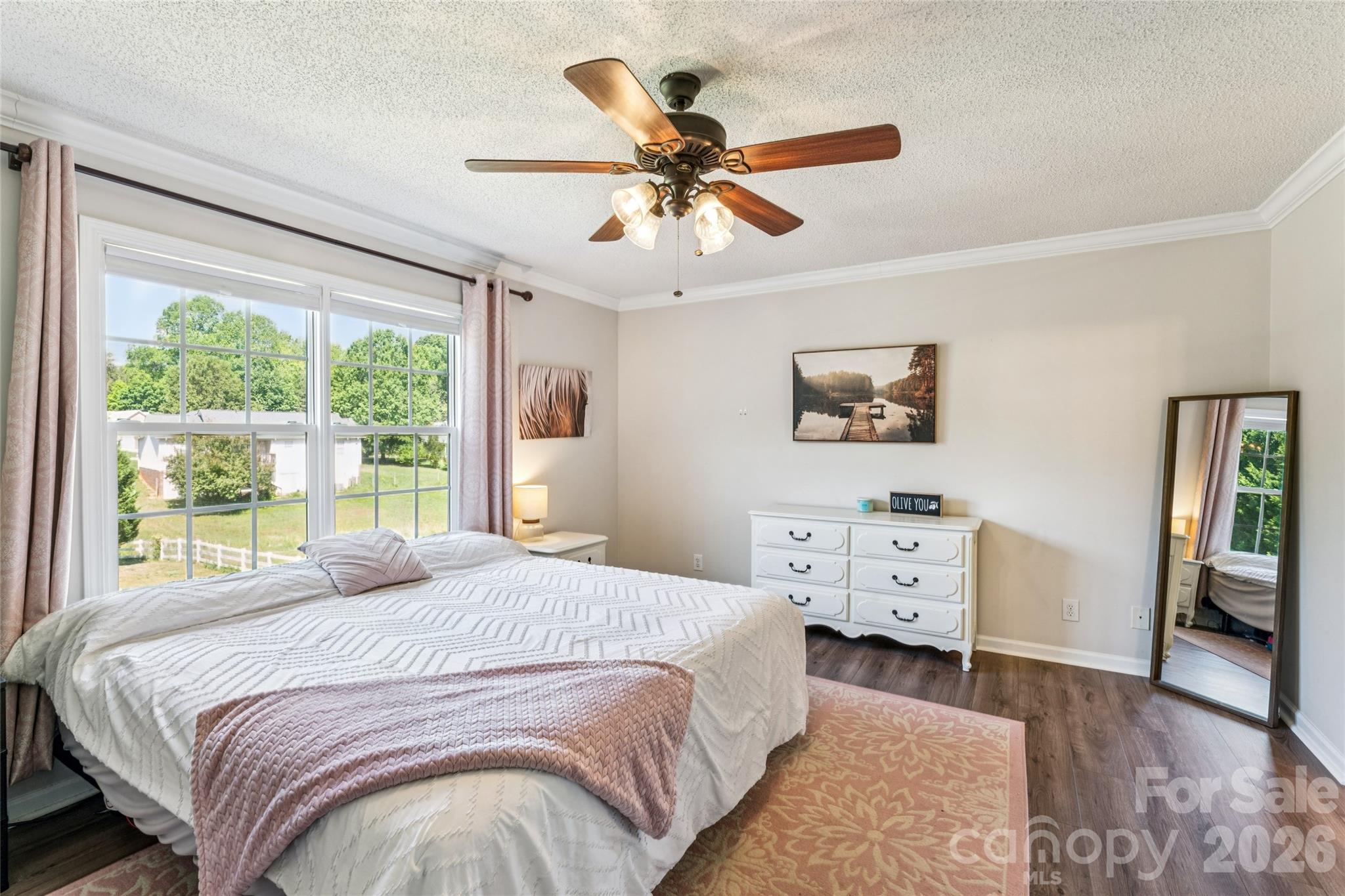 103 Quarry Way Salisbury, NC 28146 - Photo 23 of 47 a bedroom with a bed and wooden floor