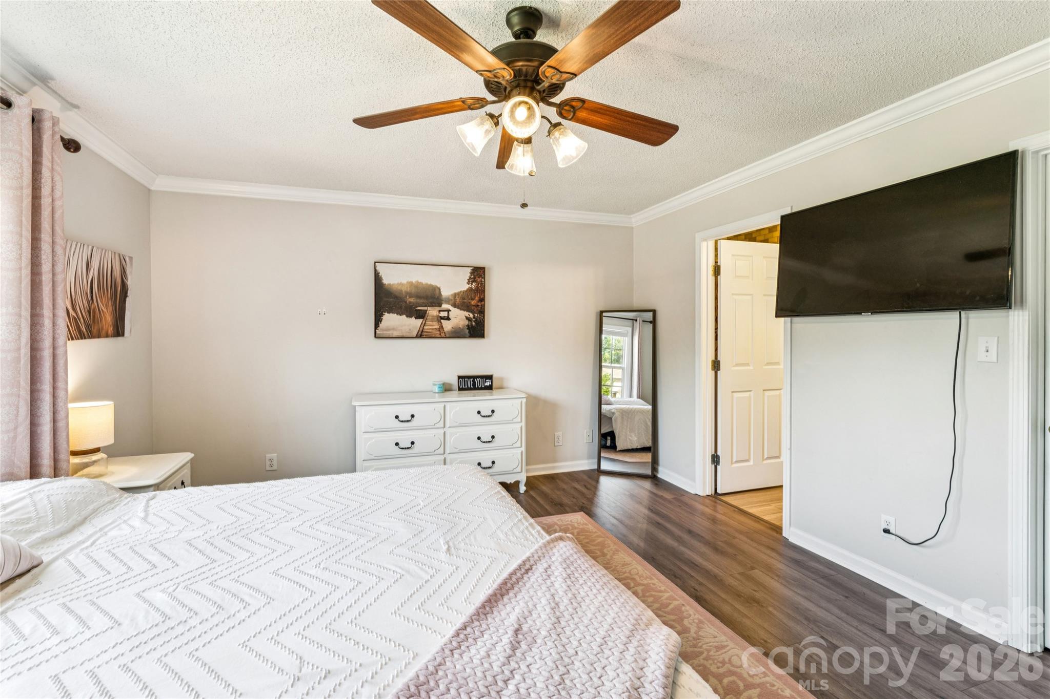 103 Quarry Way Salisbury, NC 28146 - Photo 24 of 47 a bedroom with a bed and a flat screen tv