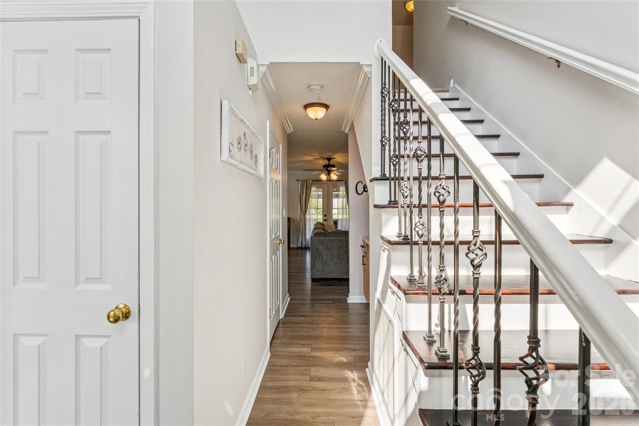 103 Quarry Way Salisbury, NC 28146 - Photo 3 of 47 a view of a hallway with wooden floor and entryway