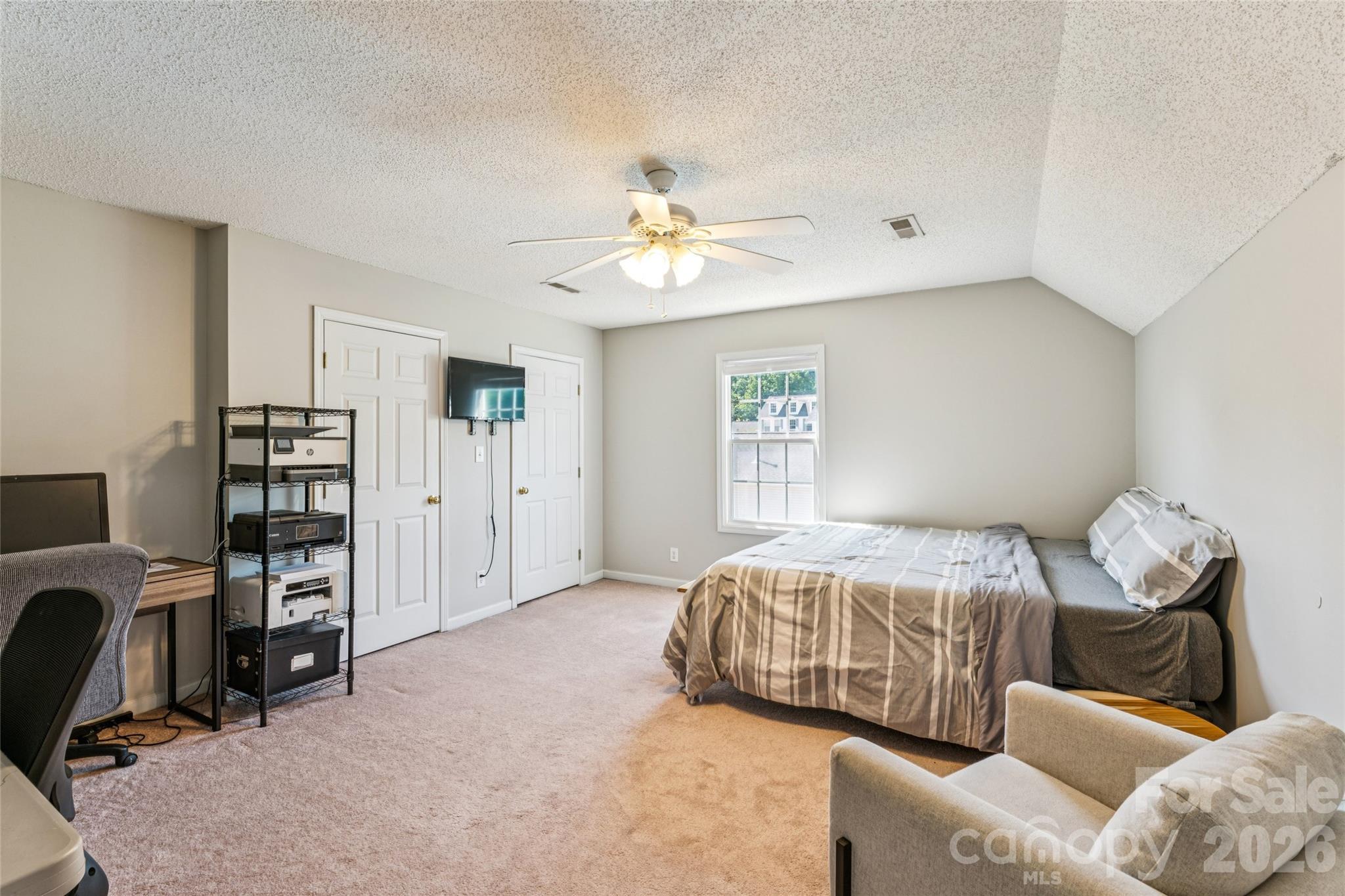 103 Quarry Way Salisbury, NC 28146 - Photo 31 of 47 a bedroom with furniture and a chandelier