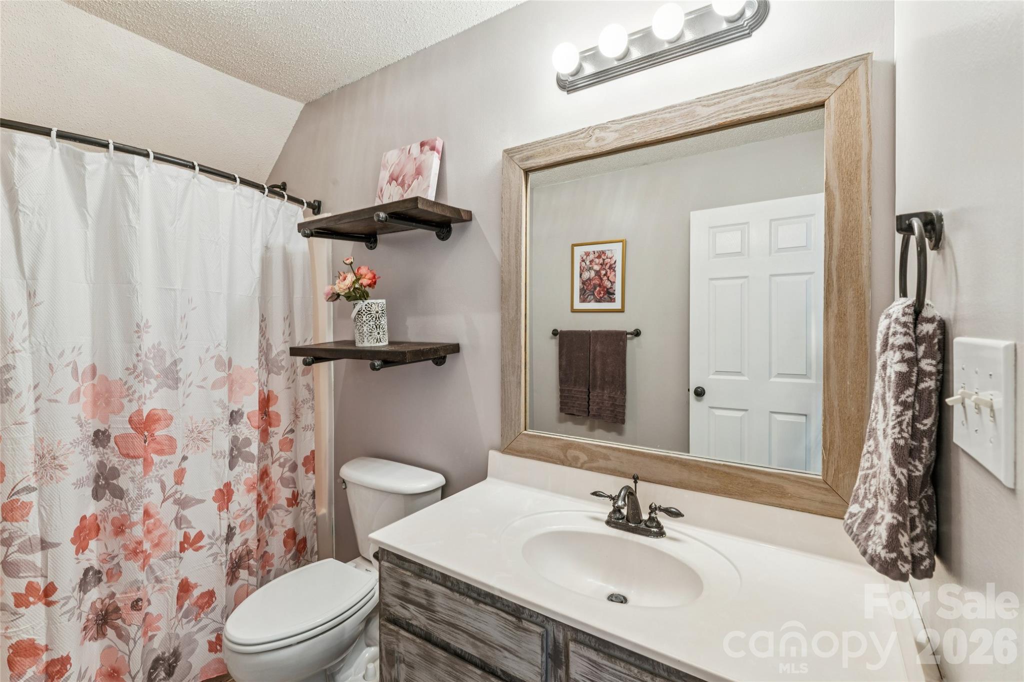 103 Quarry Way Salisbury, NC 28146 - Photo 35 of 47 a bathroom with a sink toilet and shower