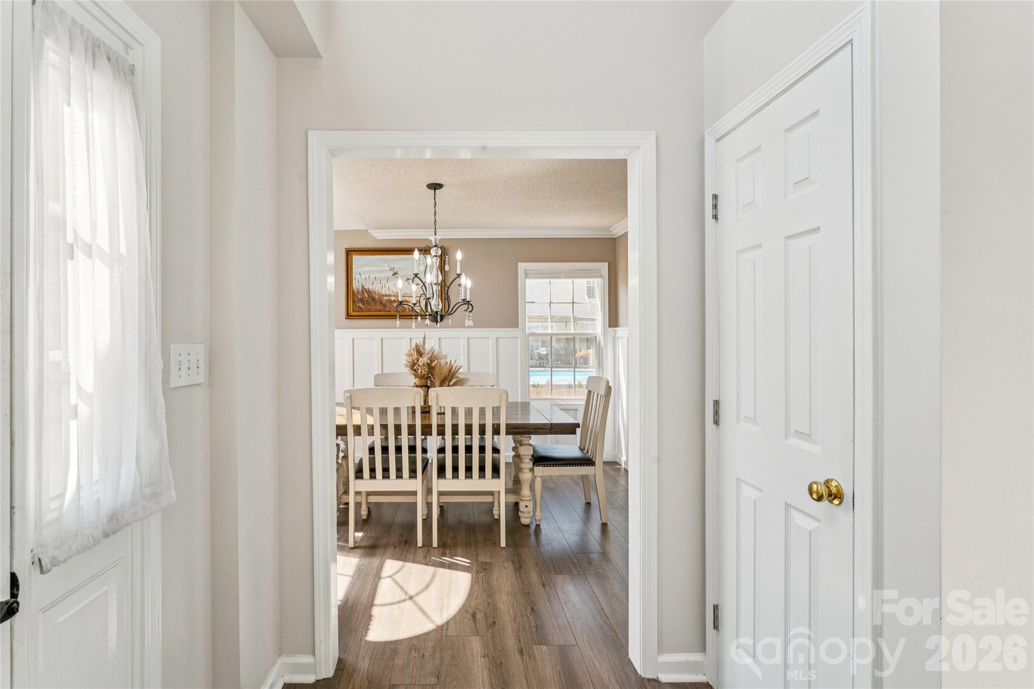 103 Quarry Way Salisbury, NC 28146 - Photo 4 of 47 a view of dining room with wooden floor and windows