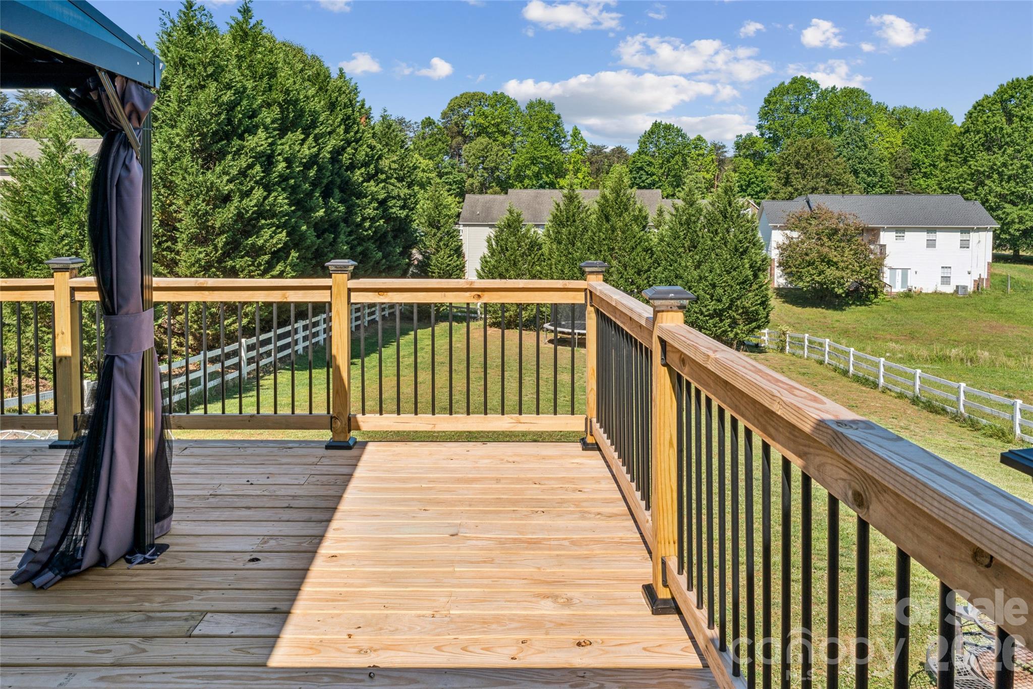 103 Quarry Way Salisbury, NC 28146 - Photo 41 of 47 a view of a balcony with wooden floor