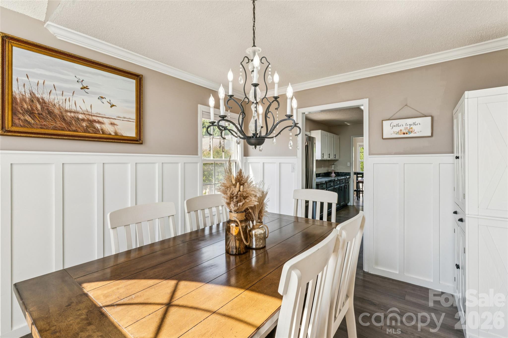 103 Quarry Way Salisbury, NC 28146 - Photo 6 of 47 a view of a dining room with furniture and a chandelier