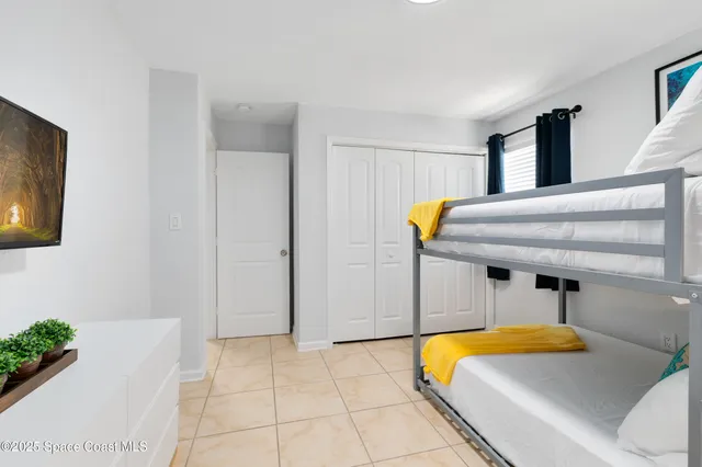 a bedroom with natural light