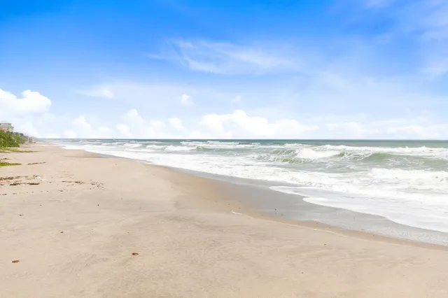 a view of beach and ocean