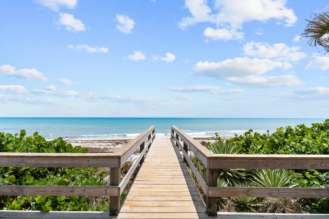 a view of balcony with furniture