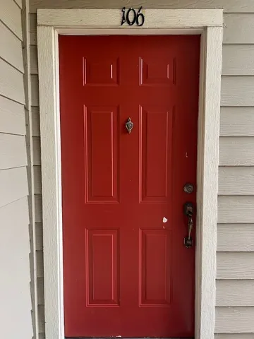 a outdoor space with lots of white furniture