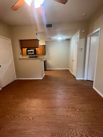 a view of a kitchen with a sink