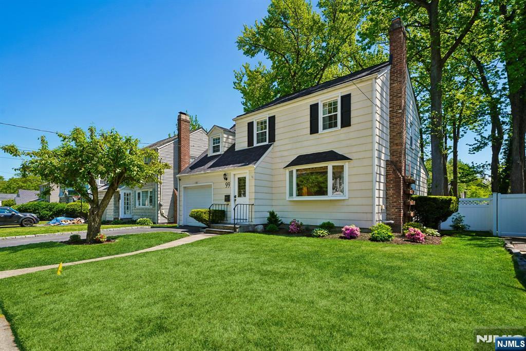 99 Ferncliff Road Bloomfield, NJ 07003 - Photo 29 of 30 a front view of house with yard and green space