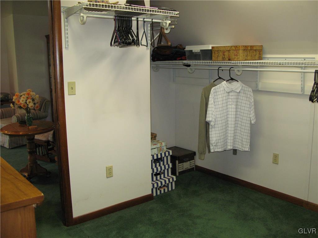 5955 Little Gap Road Kunkletown, PA 18058 - Photo 20 of 41 a view of walk in closet with clothes and shoes