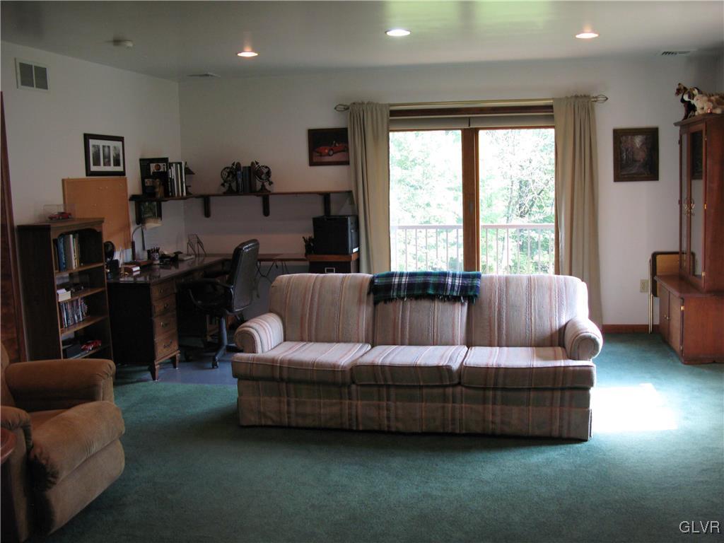 5955 Little Gap Road Kunkletown, PA 18058 - Photo 22 of 41 a living room with furniture and a window