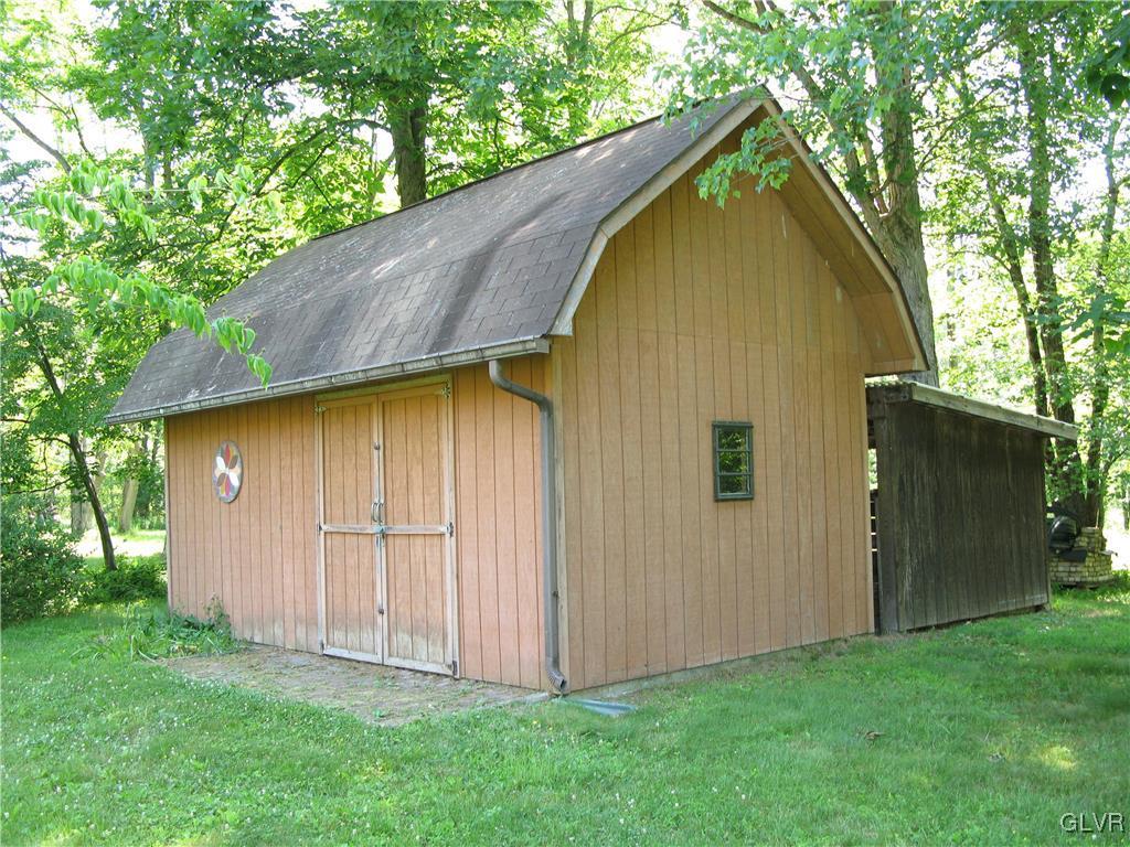 5955 Little Gap Road Kunkletown, PA 18058 - Photo 34 of 41 a view of backyard with small cabin and wooden fence