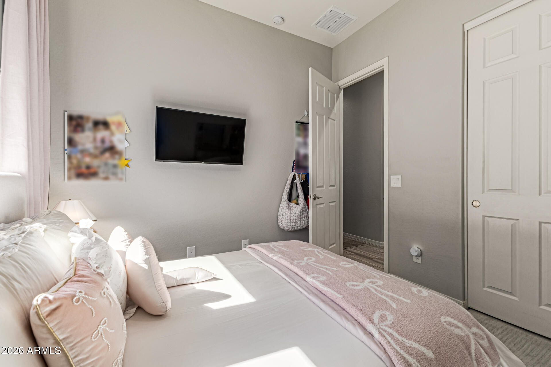 2941 South Jeffry Street Gilbert, AZ 85295 - Photo 20 of 47 a bedroom with a bed and a flat screen tv