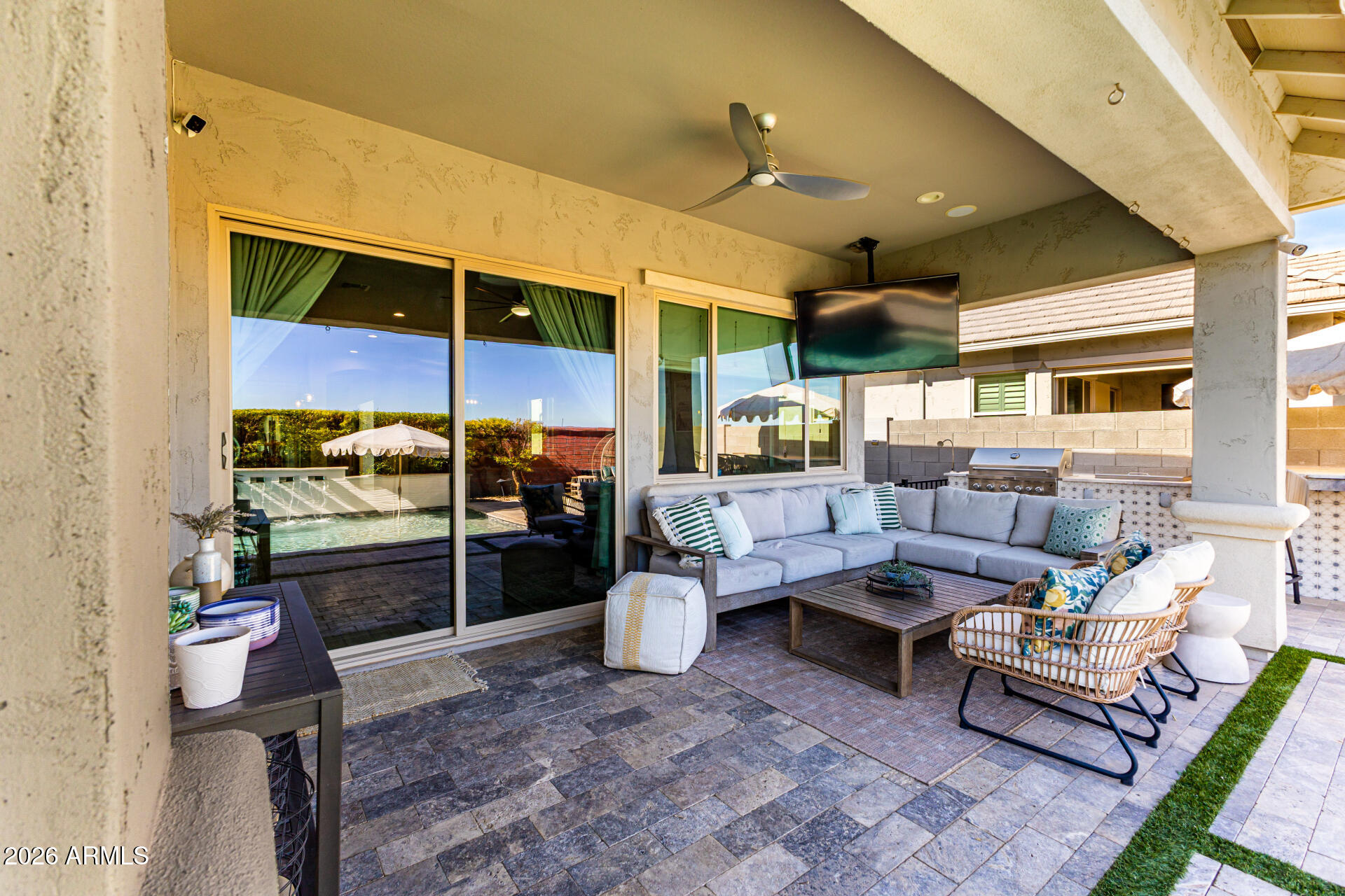 2941 South Jeffry Street Gilbert, AZ 85295 - Photo 30 of 47 a building outdoor space with patio furniture and potted plants