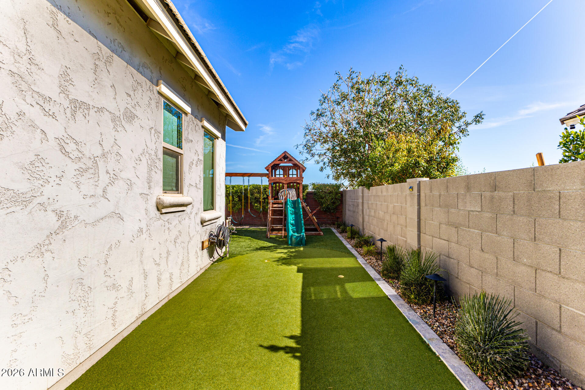2941 South Jeffry Street Gilbert, AZ 85295 - Photo 37 of 47 a view of swimming pool with a backyard