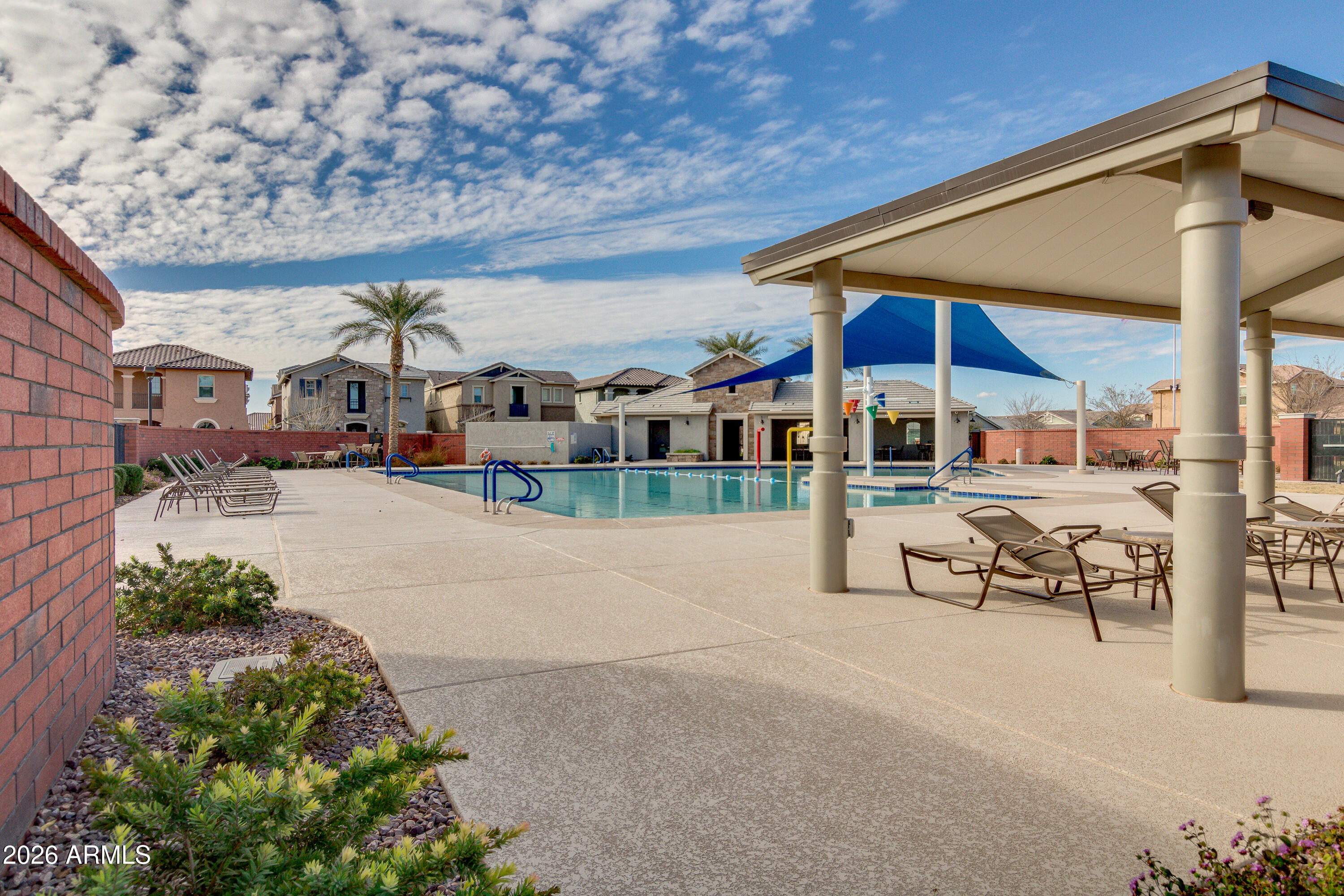 2941 South Jeffry Street Gilbert, AZ 85295 - Photo 39 of 47 a view of a building with sitting area
