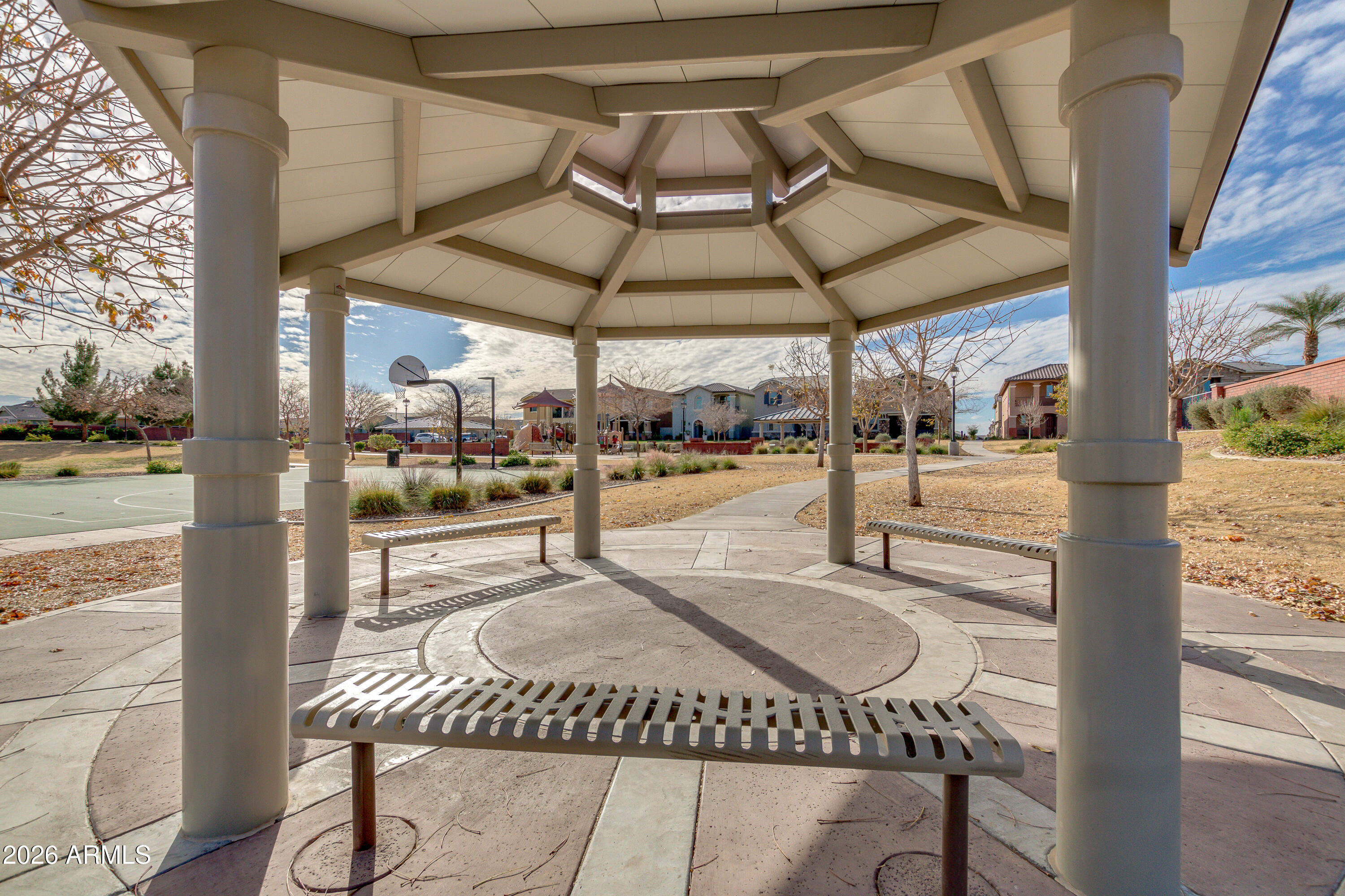2941 South Jeffry Street Gilbert, AZ 85295 - Photo 44 of 47 a patio with a table and chairs