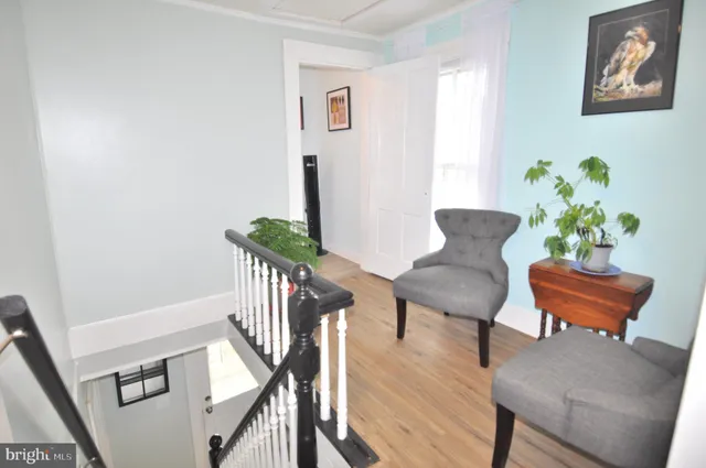 a bed room with a bed and a lamp