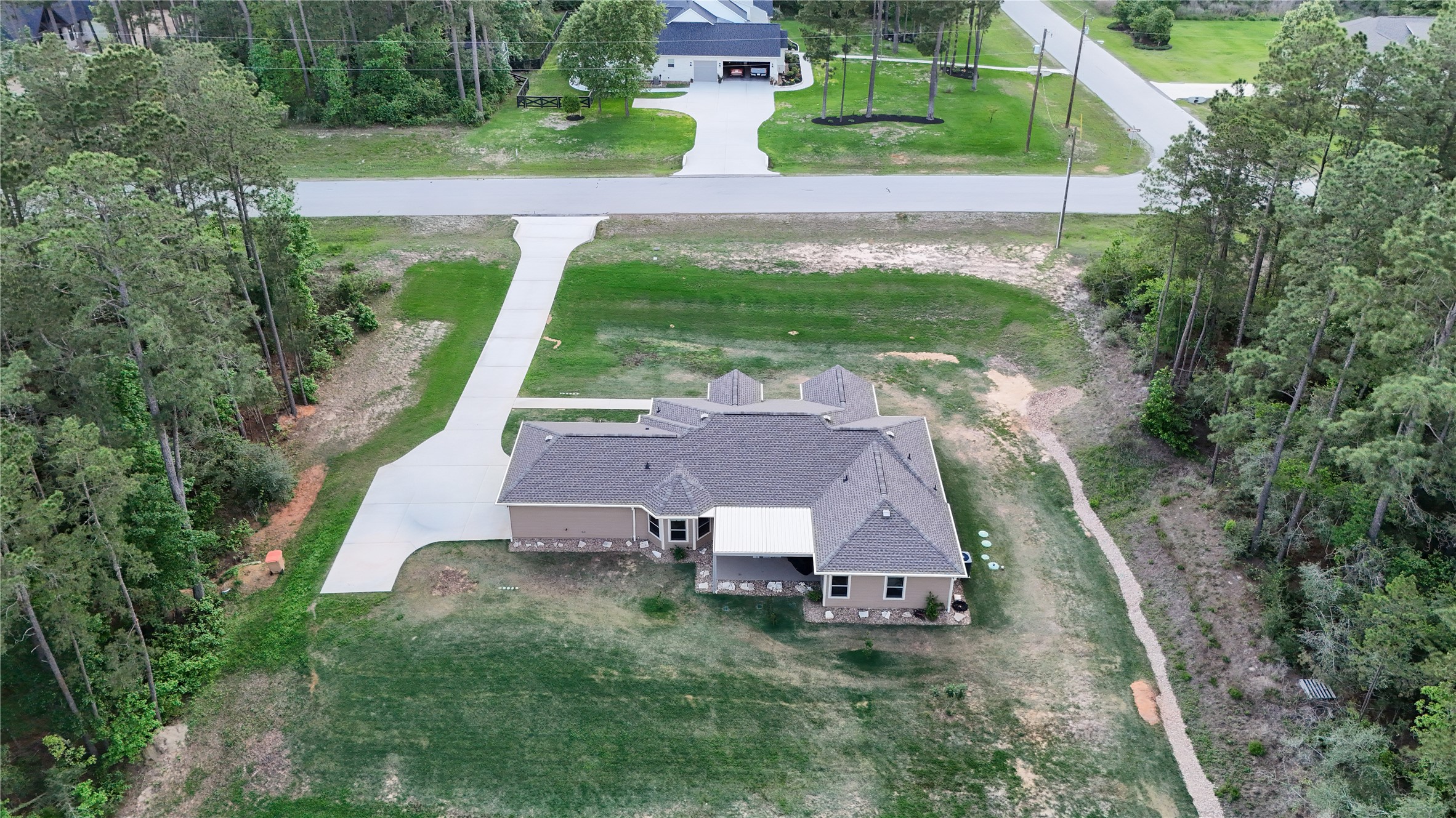 120 Sanctuary Road Huntsville, TX 77340 - Photo 36 of 38 an aerial view of a house