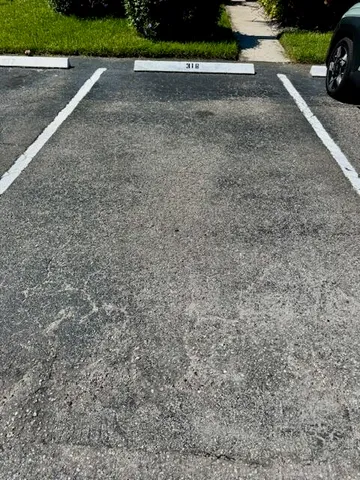 a view of street with parked cars