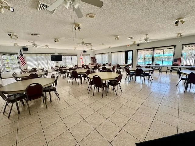 a group of people sitting in a living room