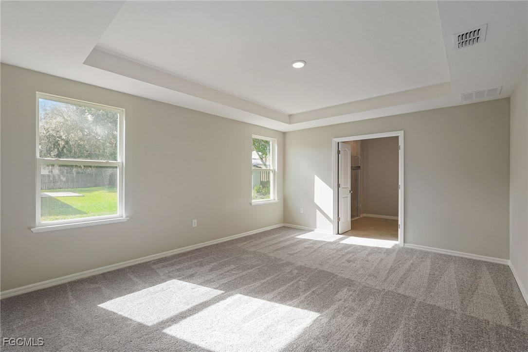 3023 North Lakewood Road LaBelle, FL 33935 - Photo 38 of 39 an empty room with windows and closet