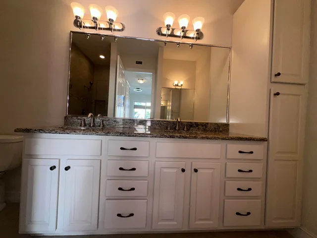 a view of a storage and utility room in bathroom