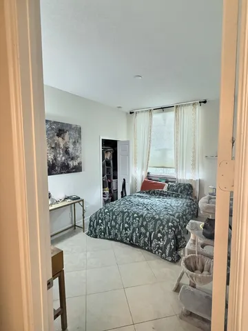 a room with a couch and chair