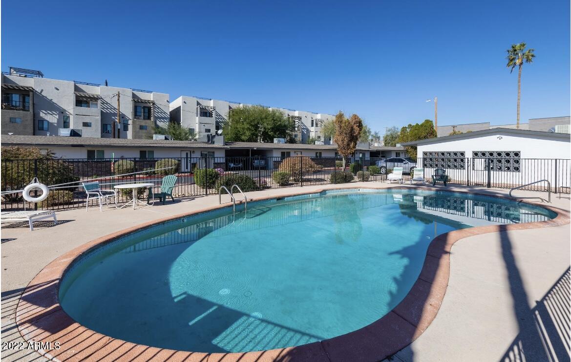 2020 West Hayward Avenue, Unit 12 Phoenix, AZ 85021 - Photo 1 of 13 a view of a swimming pool with a patio
