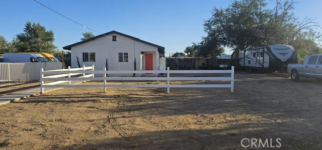 14639 Lilac Street Hesperia, CA 92345 - Photo 2 of 12 a view of a house with backyard and sitting area