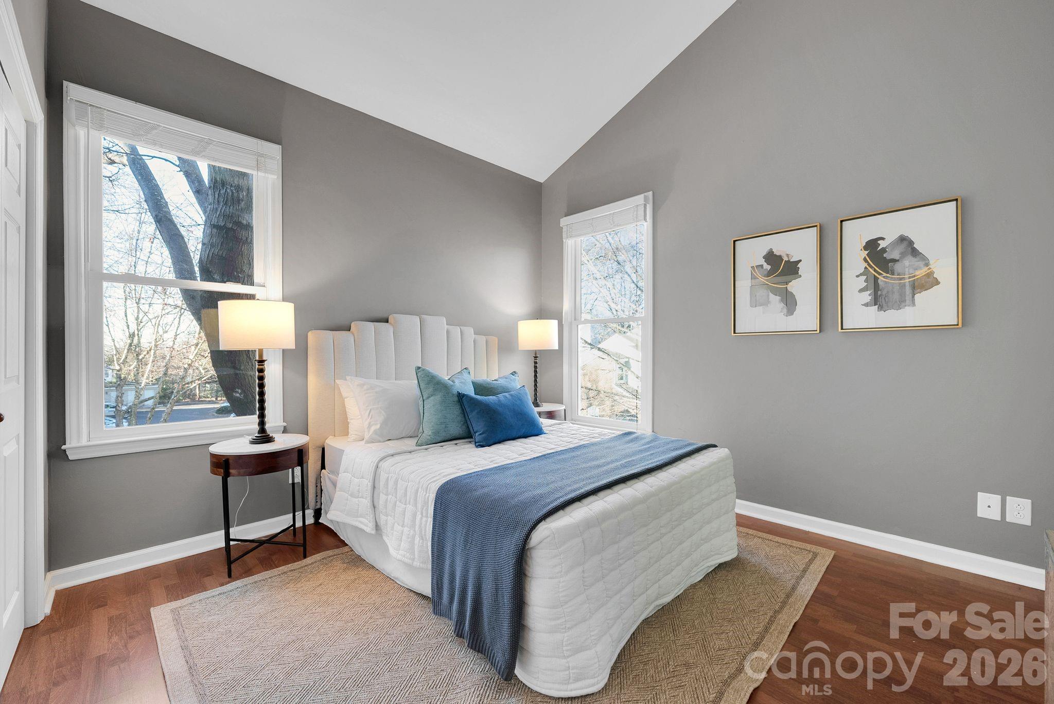 300 South Cedar Street, Unit 2 Charlotte, NC 28202 - Photo 12 of 29 a bedroom with a bed and a window