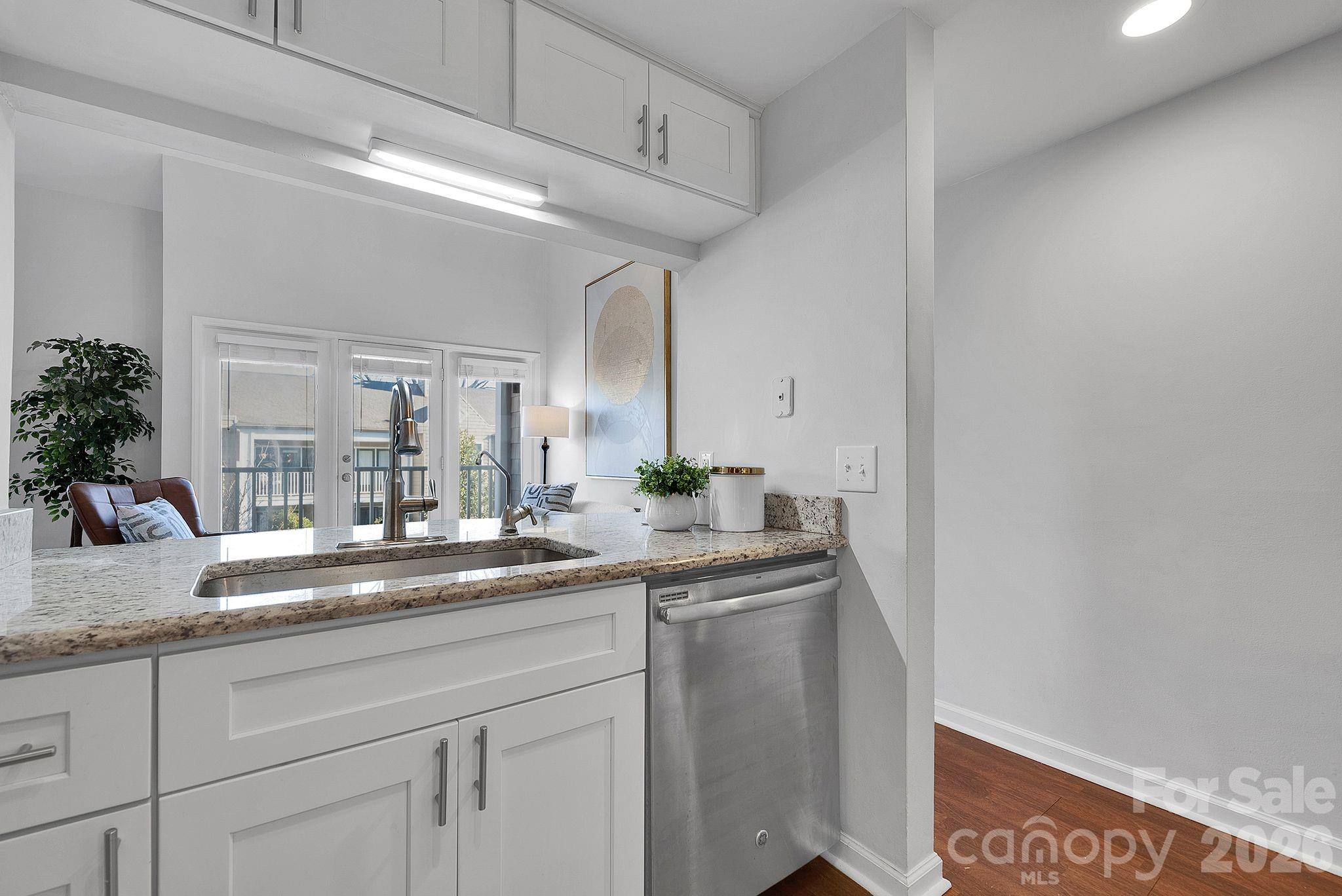 300 South Cedar Street, Unit 2 Charlotte, NC 28202 - Photo 10 of 29 a bathroom with a sink and a mirror