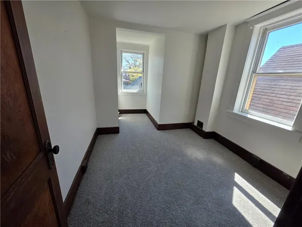 a view of empty room with front door