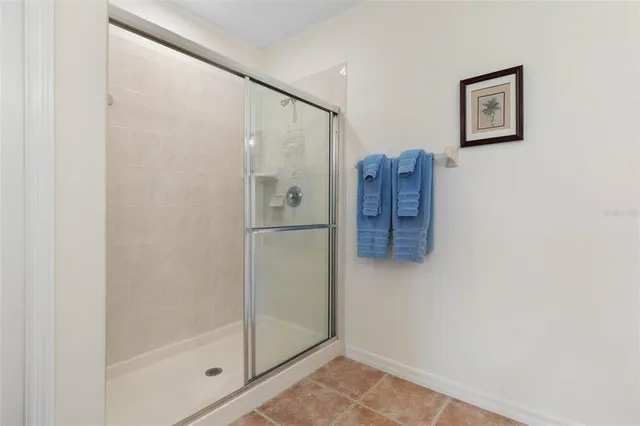 a spacious bathroom with a double vanity sink mirror and toilet