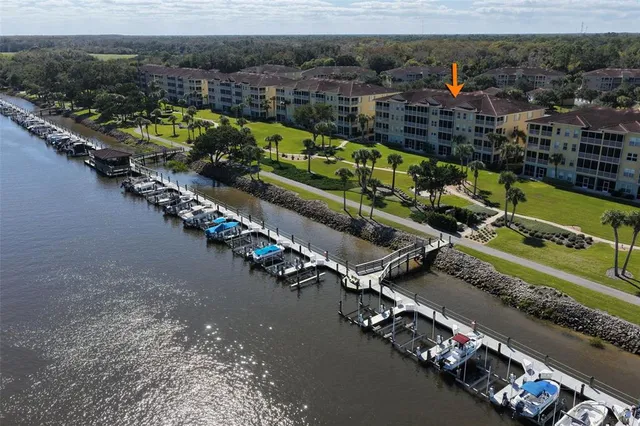 an aerial view of a house with a garden