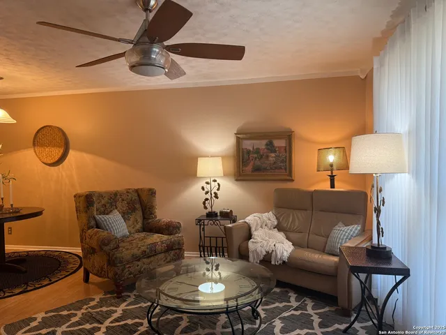 a kitchen with a sink and a stove top oven