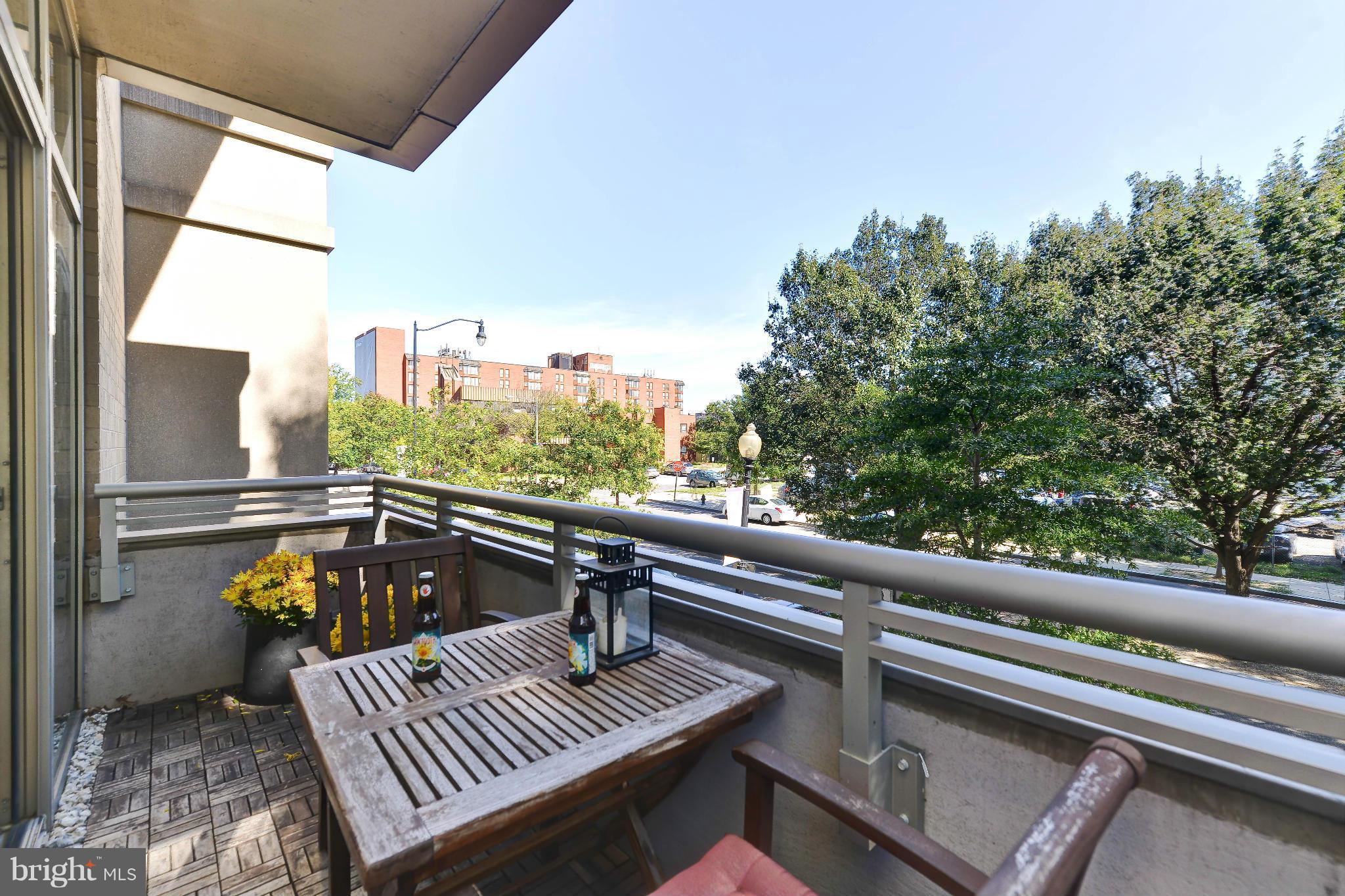 811 4th Street Northwest, Unit 218 Washington, DC 20001 - Photo 13 of 28 a view of balcony with outdoor seating