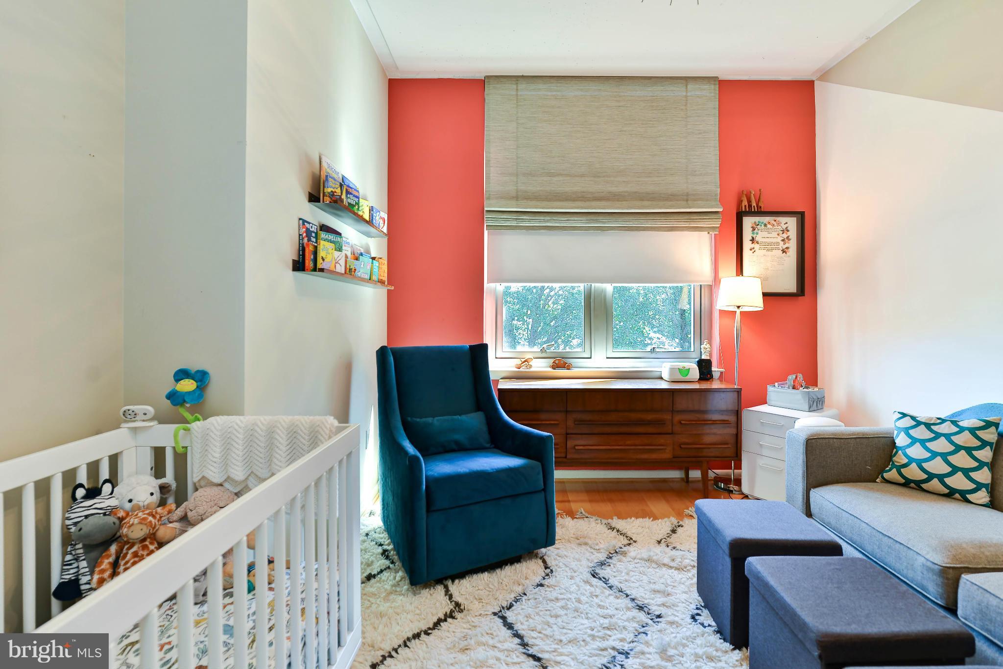 811 4th Street Northwest, Unit 218 Washington, DC 20001 - Photo 20 of 28 a living room with furniture and a window