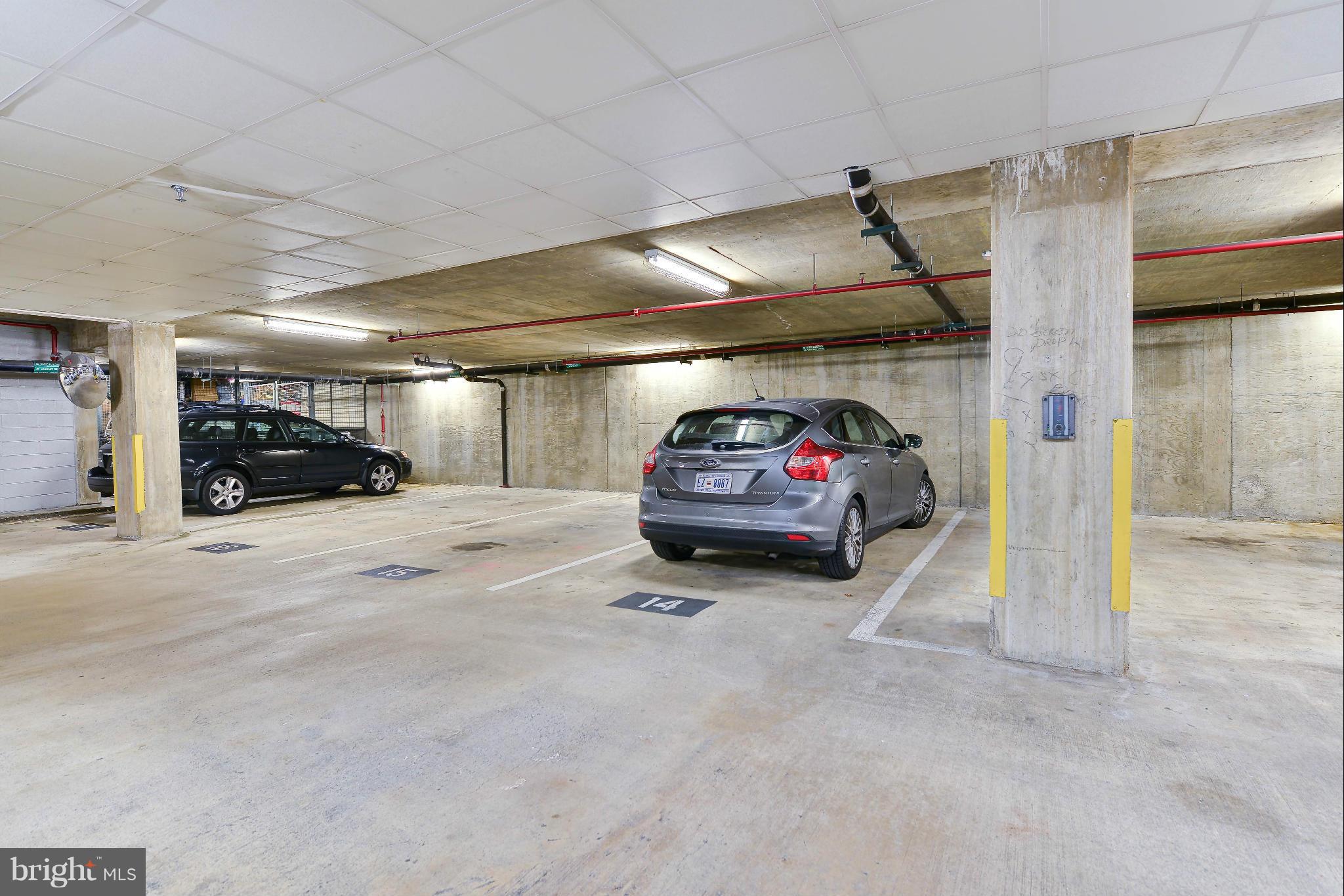 811 4th Street Northwest, Unit 218 Washington, DC 20001 - Photo 24 of 28 a view of parking garage with cars parked