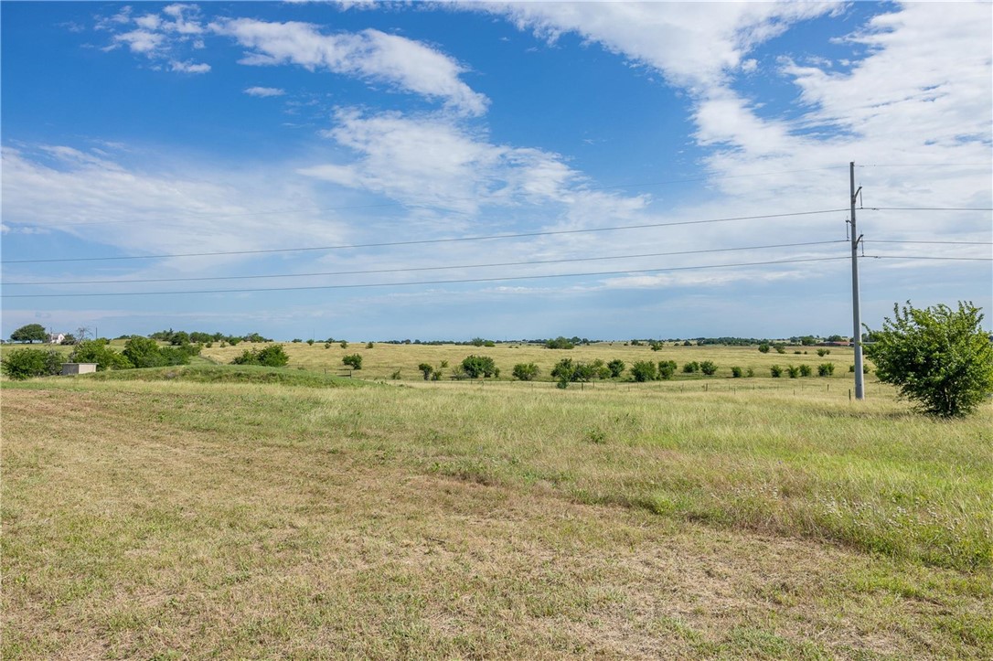 4330 Post Oak Point Road New Ulm, TX 78950 - Photo 23 of 43 a view of a field with an outdoor space