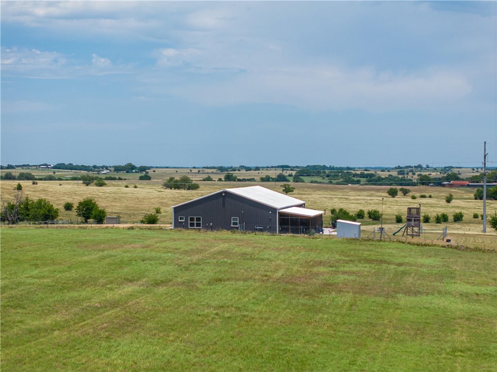 4330 Post Oak Point Road New Ulm, TX 78950 - Photo 31 of 43 a view of a lake with houses in the back