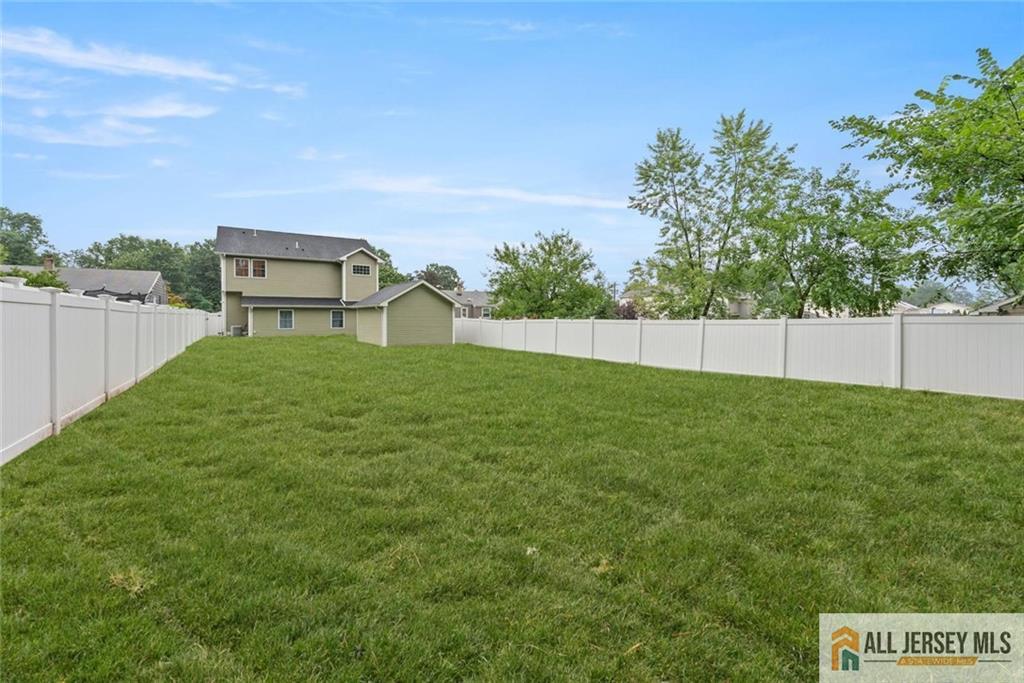 227 Temple Way Colonia, NJ 07067 - Photo 3 of 30 a view of a backyard