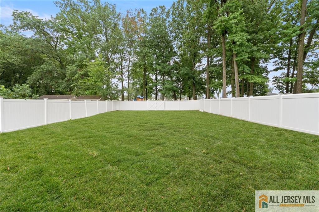 227 Temple Way Colonia, NJ 07067 - Photo 4 of 30 a view of outdoor space and yard