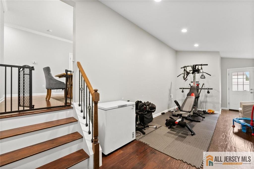 227 Temple Way Colonia, NJ 07067 - Photo 7 of 30 a view of a room with gym equipment